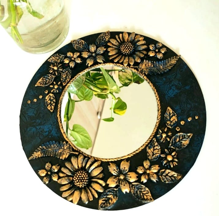 Wall Decor With Centre Mirror and Clay Detailing